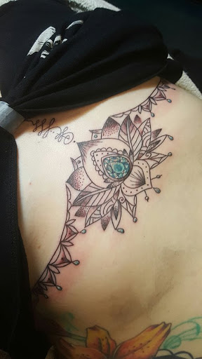 Explore letter t tattoo ideas, creative tattoo ideas in North Aurora, available at Ink Bar Tattoo