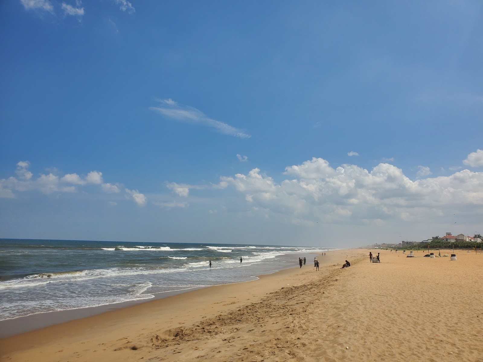 Foto von Kottivakkam Beach mit lange, gerade küste