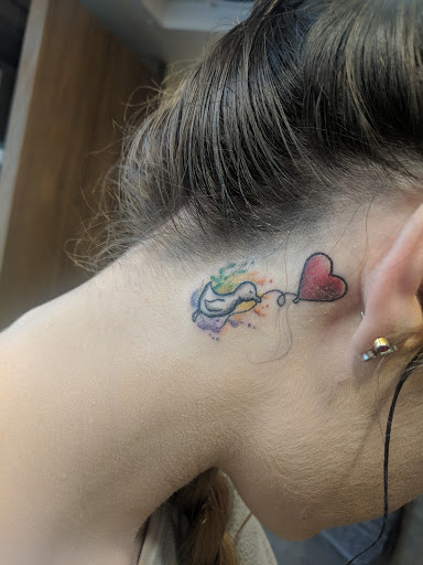 Explore cross tattoo ideas for woman, creative tattoo ideas in Fresno, available at Island Ink Tattoo