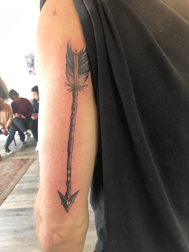 Explore cardinal tattoo ideas, creative tattoo ideas in Avon, available at Avanti Tattoo