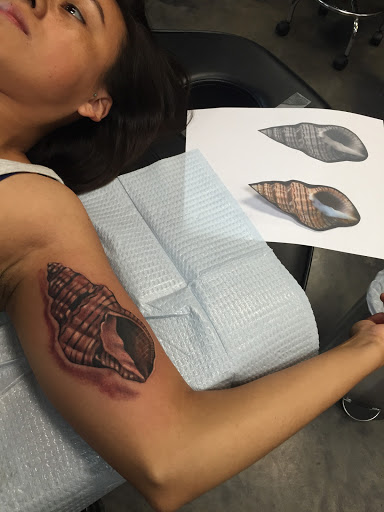 Explore cross cover up tattoo ideas, creative tattoo ideas in Garden Grove, available at Dr. Tattoo Studio
