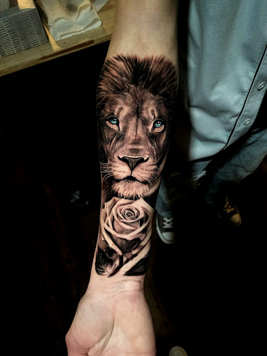 Explore rock lee tattoo ideas, creative tattoo ideas in Johnson City, available at Gold Cross Tattoo Co.