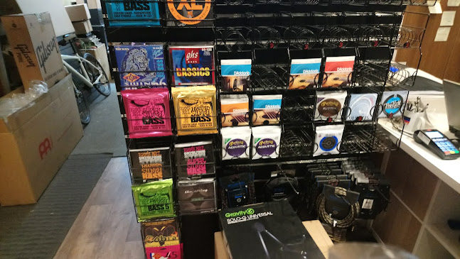 Oroszlánbarlang Hangszerbolt, Gitárszaküzlet, Szerviz - Budapest