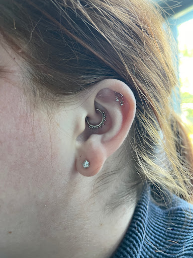 Explore triangle tattoo ideas, creative tattoo ideas in Cambridge, available at Luckys Tattoo and Piercing