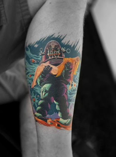 Explore arm cross tattoo ideas, creative tattoo ideas in Denison, available at Calypso Tattoo