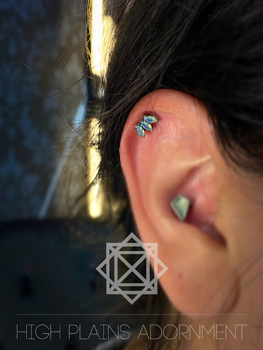 Explore female stomach tattoo ideas, creative tattoo ideas in Casper, available at High Plains Adornment