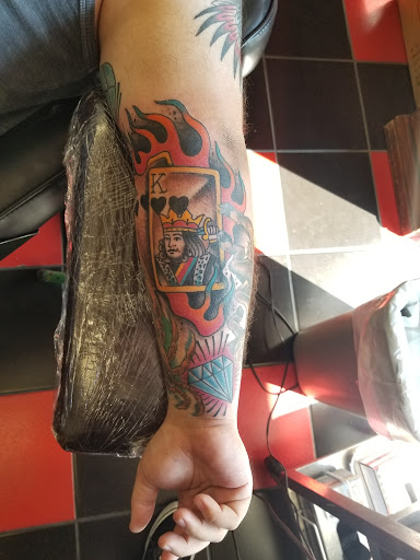 Explore cover up tattoo ideas for ladies, creative tattoo ideas in Milwaukee, available at Atomic Tattoos