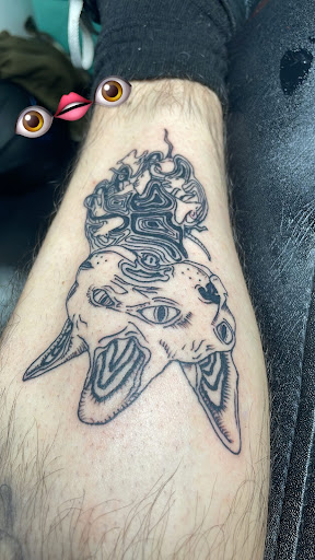 Explore black and white sleeve tattoo ideas, creative tattoo ideas in Fayetteville, available at Envision Tattoo