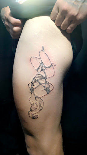 Explore calf leg tattoo ideas, creative tattoo ideas in Chicago, available at Twisted Tattoo Studio