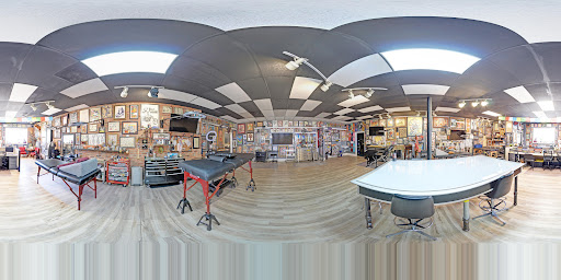 Find angel tattoo ideas for ladies for your next unique tattoo in Bloomington at Artkore Tattoo