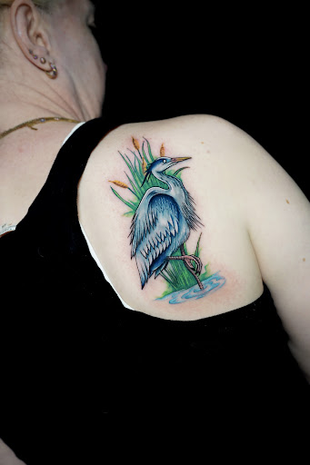 Explore traveler tattoo ideas, creative tattoo ideas in New York, available at Red Baron Ink Tattoo and Piercing