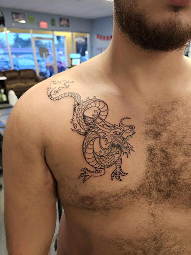 Explore blessed tattoo ideas for females, creative tattoo ideas in Palm Harbor, available at Angry Owl Tattoo and Piercing