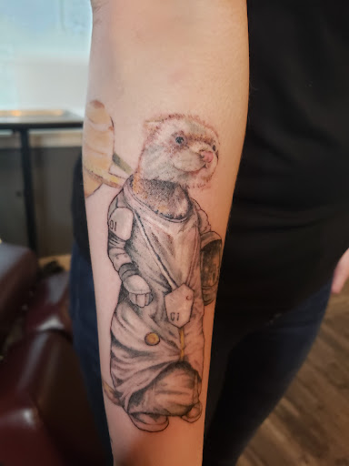 Explore duck tattoo ideas, creative tattoo ideas in North Bend, available at The Rusty Needle Tattoo Parlor