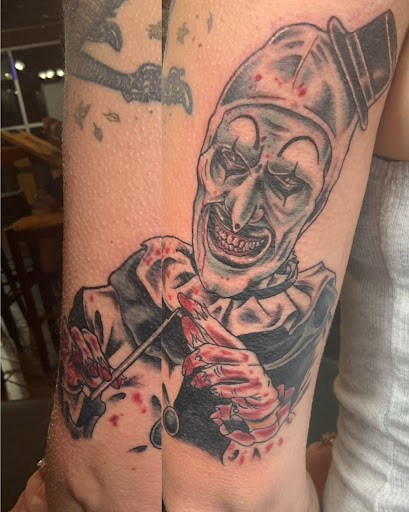 Explore ripped skin tattoo ideas, creative tattoo ideas in Albuquerque, available at Relic Tattoo Co.