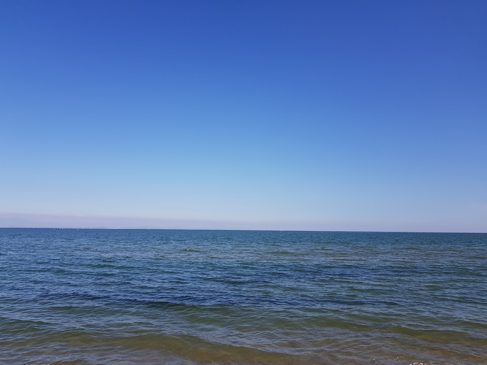 Foto van Agiannis beach II met turquoise puur water oppervlakte