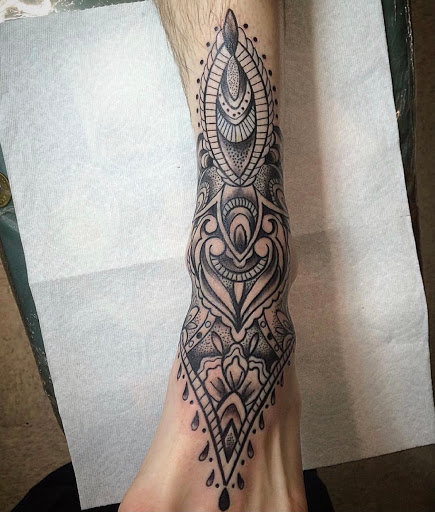 Explore cool hand tattoo ideas, creative tattoo ideas in Everett, available at Sunken Ship Tattoos