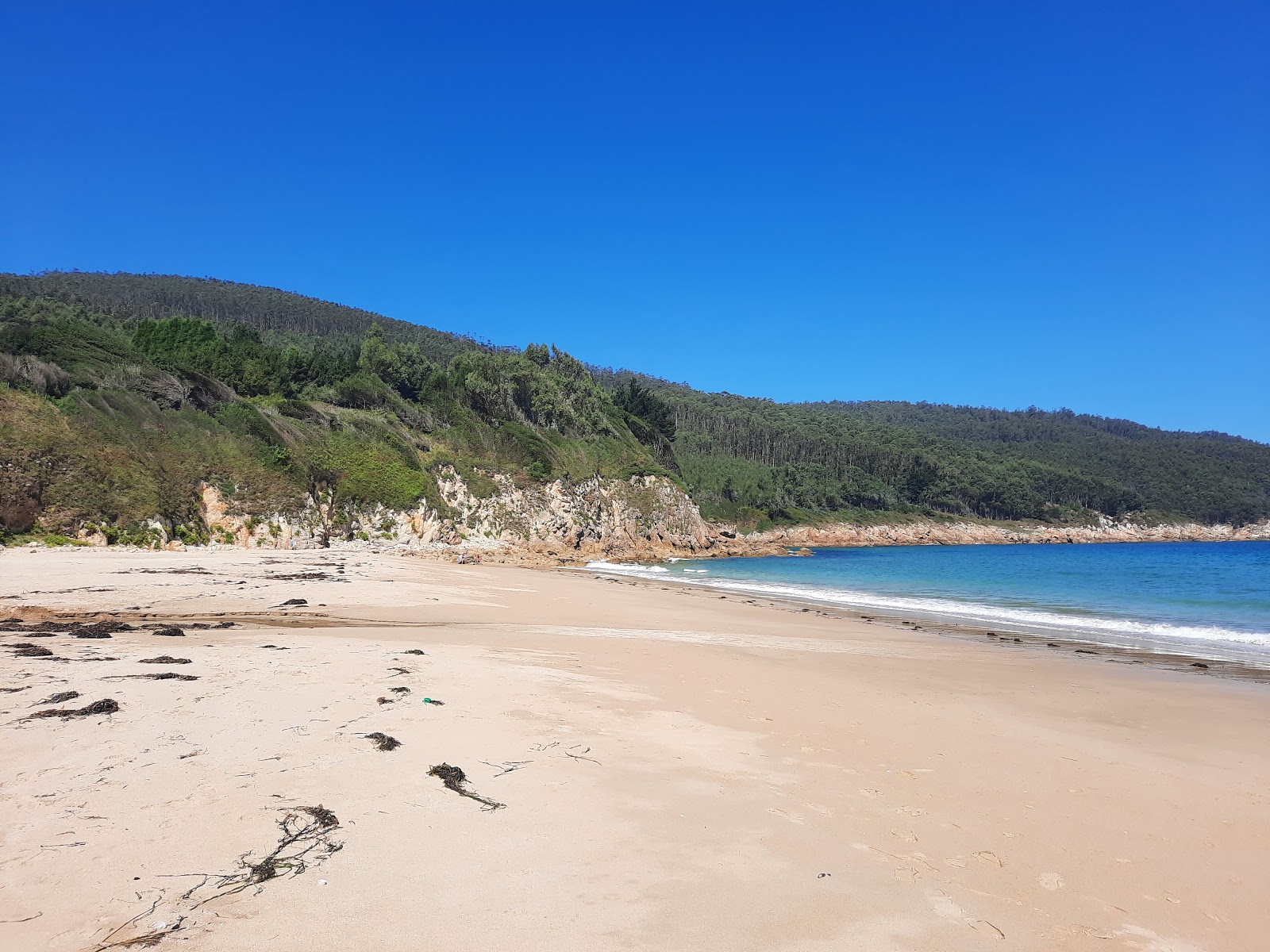 Foto di Praia de Vilela con una superficie del sabbia bianca fine