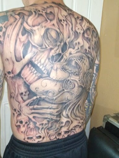 Explore tattoo ideas for photographers, creative tattoo ideas in Roanoke, available at RailYard INK