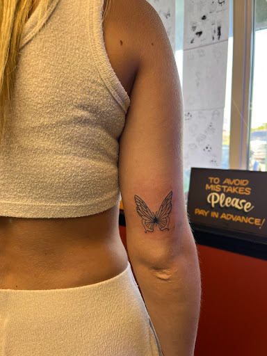 Explore upper arm sleeve tattoo ideas, creative tattoo ideas in Foley, available at Symbolic Ink Tattoo Studio