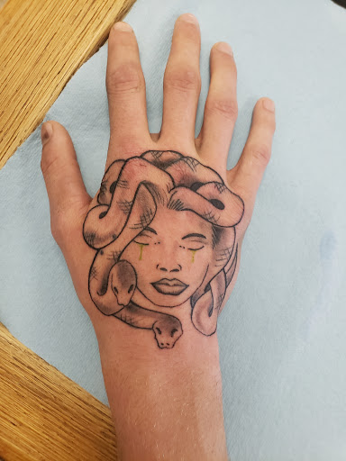 Explore cute cover up tattoo ideas, creative tattoo ideas in Clarkston, available at Rogue Tattoo