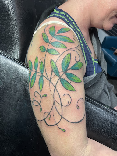 Explore heart and rose tattoo ideas, creative tattoo ideas in Spokane, available at All About It Tattoo Studio