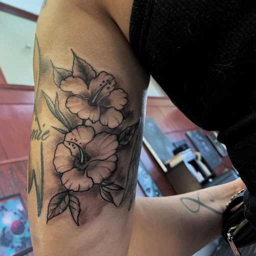 Explore tattoo ideas with your child's name, creative tattoo ideas in Clinton, available at Black Relic Tattoo