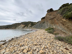 Photo de Selitsa Strand entouré de montagnes