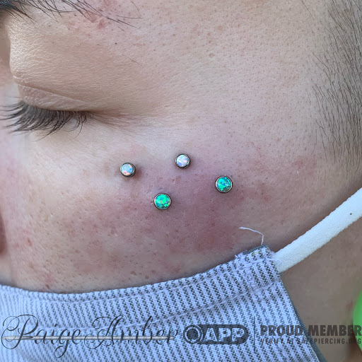 Explore women's arm tattoo ideas, creative tattoo ideas in Oshkosh, available at Piercings by Paige at Big Guns Tattoo