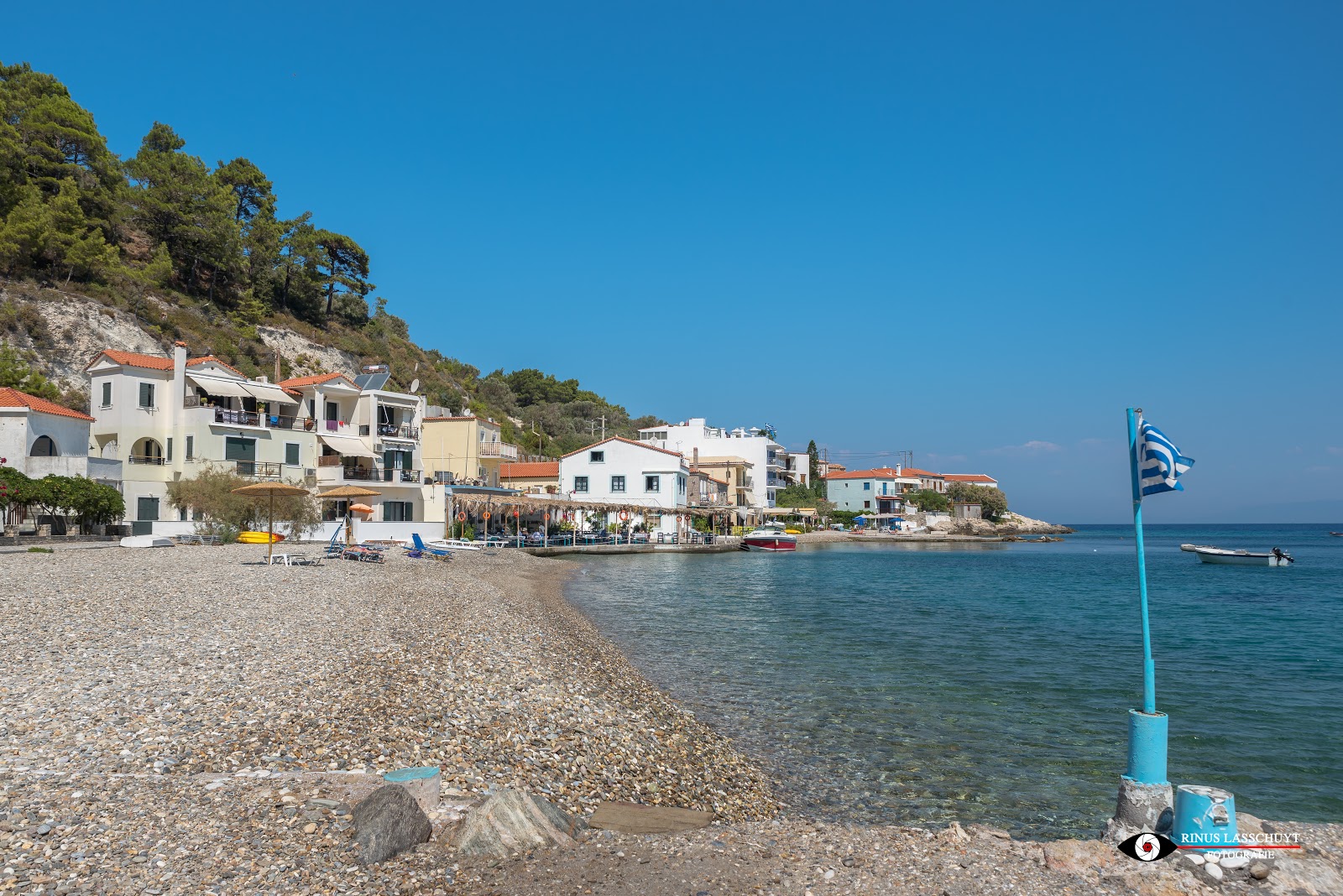 Avlakia beach III的照片 带有轻卵石表面