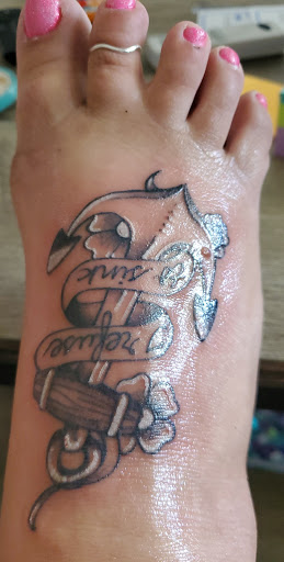 Explore hawk tattoo ideas, creative tattoo ideas in Bradford, available at Cutthroat Tattoo