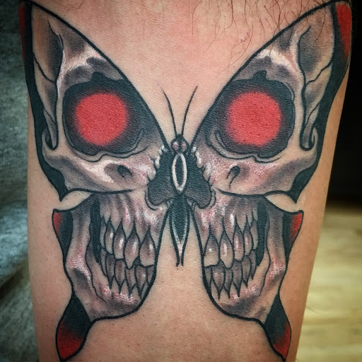 Explore simple hummingbird tattoo ideas, creative tattoo ideas in New York, available at Red Baron Ink Tattoo and Piercing