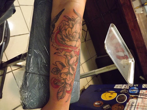 Explore small neck tattoo ideas, creative tattoo ideas in Princeton, available at Custom Dreams Tattooing and Body Piercing