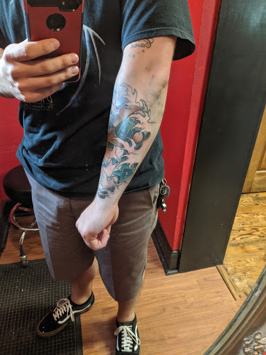 Explore tattoo ideas graffiti, creative tattoo ideas in Council Bluffs, available at Black Squirrel Tattoo