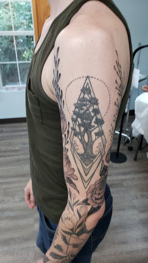 Explore calf tattoo ideas for females, creative tattoo ideas in Lawrenceville, available at Steele Ink Studios Body Art