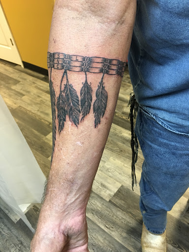 Explore back tattoo ideas for men, creative tattoo ideas in Warner Robins, available at Untold Pain Tattoo Studio