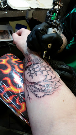 Explore rose cover up tattoo ideas, creative tattoo ideas in Chicopee, available at INkd By Coleman