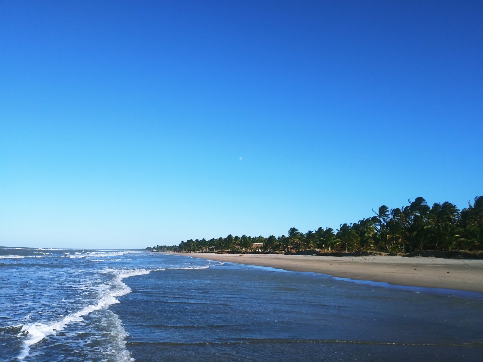 Foto de Playa Villa Cuahutemoс con arena brillante superficie