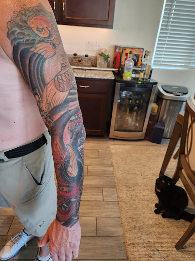 Find tattoos under the breast ideas for your next unique tattoo in Buckeye at Irie Art in Ink