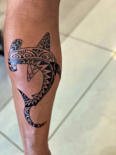 Explore colorful flower tattoo ideas, creative tattoo ideas in Houston, available at 3rd Generation Ink