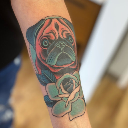 Find dragon arm tattoo ideas for your next unique tattoo in Buffalo at Stay Weird Tattoo