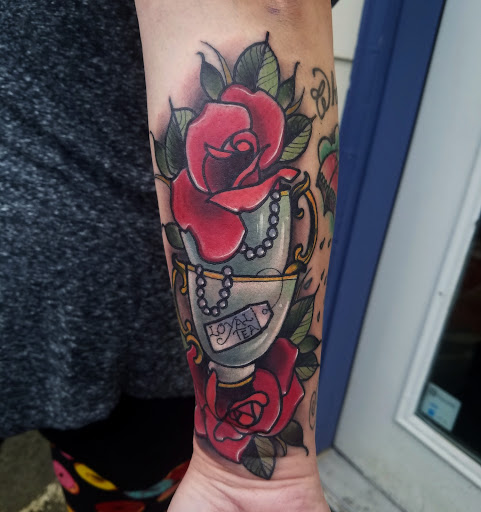 Explore feather memorial tattoo ideas, creative tattoo ideas in Snohomish, available at Unknown Tattoo Co.