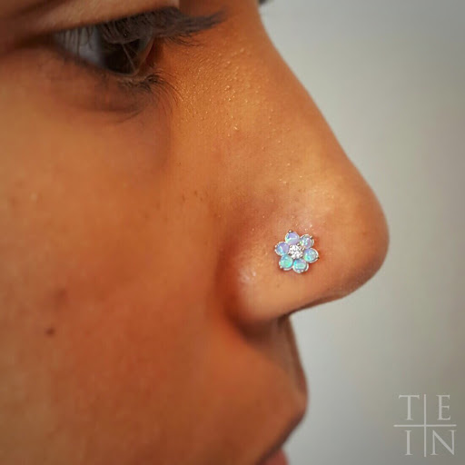 Explore tattoo ideas for free spirit, creative tattoo ideas in Brooklyn, available at The End Is Near Brooklyn - Professional Piercing & Fine Jewelry