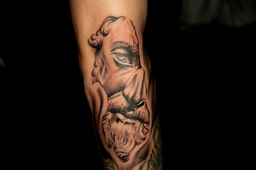 Explore tattoo shoulder ideas, creative tattoo ideas in Columbus, available at Broken Tarot Tattoo Parlour