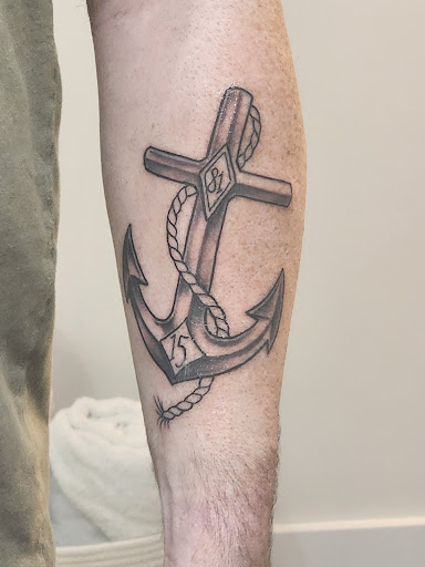 Find mom of 4 tattoo ideas for your next unique tattoo in Fall River at Indelible Ink Tattoo Studio 2.0