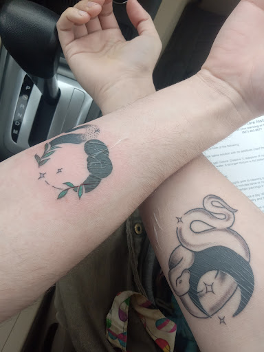 Explore women's forearm tattoos ideas, creative tattoo ideas in Northfield, available at Kinship Collective Tattoo