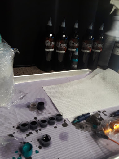 Tattoo Shop «Shotgun Tattoos & Body Piercing», reviews and photos, 307 E Moore Ave, Terrell, TX 75160, USA