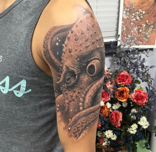 Explore billy joel tattoo ideas, creative tattoo ideas in Bryan, available at The Blackest Crow Tattoo Studio