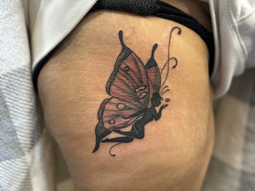 Explore cute behind the ear tattoo ideas, creative tattoo ideas in Etters, available at Twisted Mad Hatter tattoo