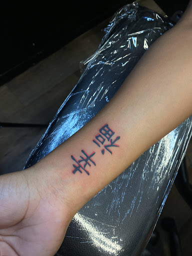 Explore tattoo cuff ideas, creative tattoo ideas in Idaho Falls, available at Sinner Tattoo Studio