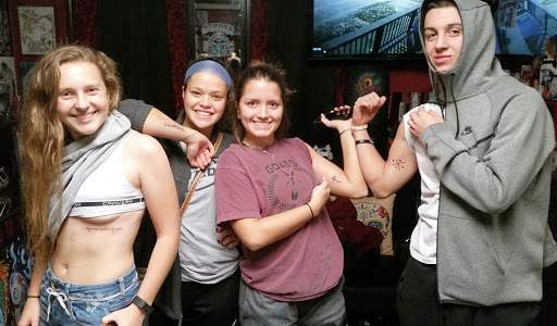 Explore cover up ideas for dark tattoos, creative tattoo ideas in Erie, available at EliKingInk